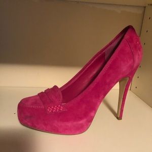 Hot pink suede pumps